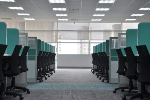 low angle of chairs in office cubicles